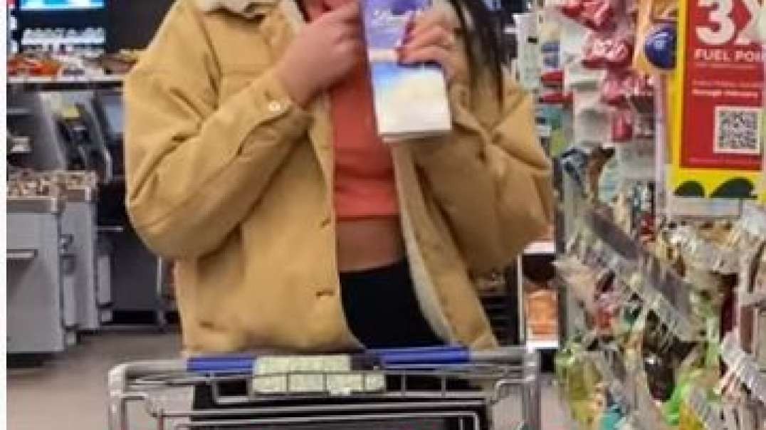 Taste Tester is gross   Woman eating  while shopping